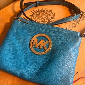 MICHAEL
Michael Kors
Blue Pebbled Leather
Multipocket Adele 
Crossbody
Bag